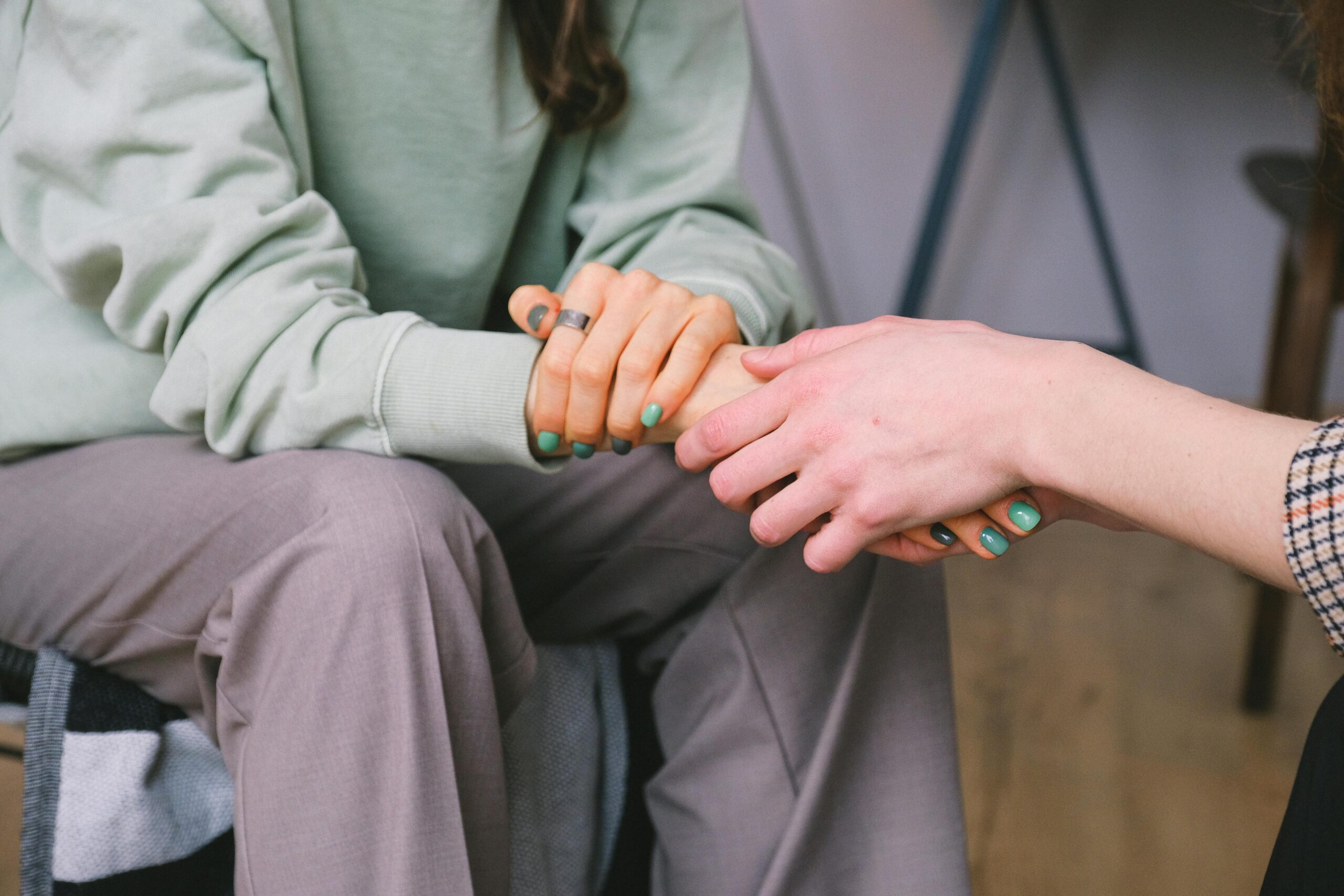 holding hands, no faces